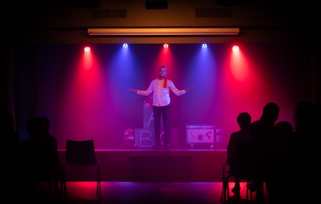 confident public speaker on stage